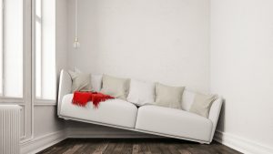 Oversized couch in a small space photo