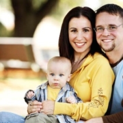 Young couple with baby on lap